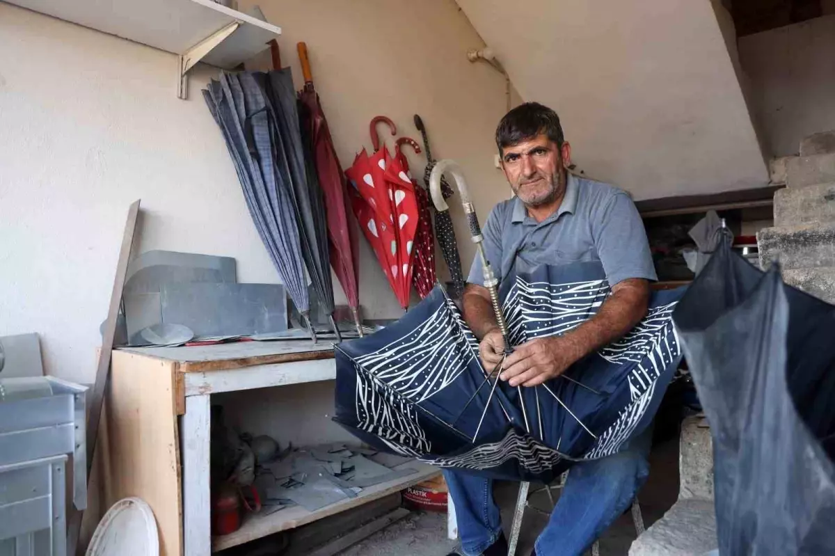 kurakligin ardindan gelen yagmurda semsiye tamiri talepleri artiyor FJU3PgNj.jpg